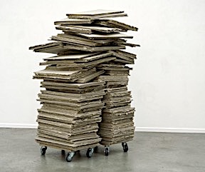 *2 Stapel*, 2020, Graupappe, Holz, R&auml;der
ca. 170 x 120 x 114 cm
Galerie Werner Wohlh&uuml;ter